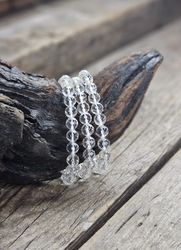 Bergkristall, armband 8mm facetterade pärlor