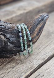 Regnbågsfluorit, armband 4mm runda pärlor