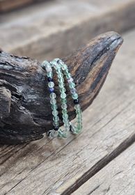 Regnbågsfluorit, armband 4mm runda pärlor