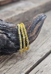 Guldrutilkvarts #2, armband 4mm runda pärlor