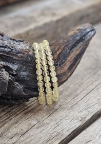 Guldrutilkvarts, armband 6mm runda pärlor