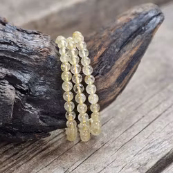 Guldrutilkvarts, armband 6mm runda pärlor