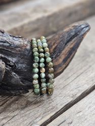 Ryolit, armband 6mm runda pärlor