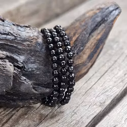 Jet (Fossilerad kolmineral), armband 6mm runda pärlor