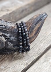 Svart Opal, armband 6mm runda pärlor