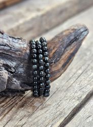 Regnbågsobsidian, armband 6mm runda pärlor