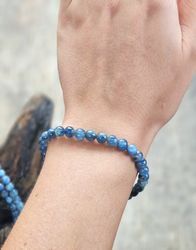 Kyanit extra, armband 6mm runda pärlor