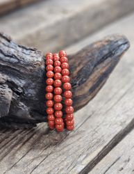 Röd Jaspis, armband 6mm runda pärlor