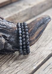Svart Safir, armband 6mm runda pärlor