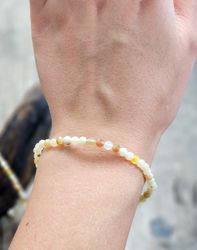 Fire Opal (Eldopal), armband 4mm facetterade pärlor
