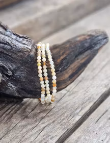 Fire Opal (Eldopal), armband 4mm facetterade pärlor