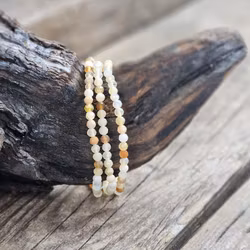 Fire Opal (Eldopal), armband 4mm facetterade pärlor