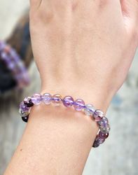 Super Seven Ametist, armband 8mm runda pärlor
