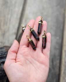 Oxöga polerad spets, guldpläterat hänge