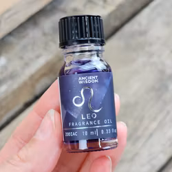 Stjärnteckenolja Lejonet (Leo) – Zodiak aromaolja med glitter, 10 ml