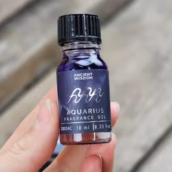 Stjärnteckenolja Vattumannen (Aquarius) – Zodiak aromaolja med glitter, 10 ml
