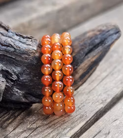 Karneol, armband 10mm runda pärlor