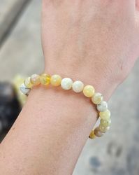 Gul Opal, armband 8mm runda pärlor