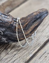 Guldrutilkvarts, armband 3mm facetterade pärlor macramé