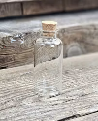 Glasflaska med kork, mellan