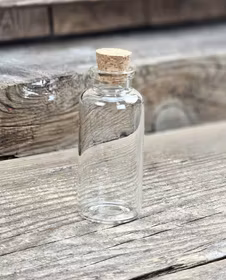 Glasflaska med kork, mellan