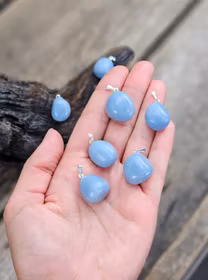 Angelit trumlad, silverpläterat hänge