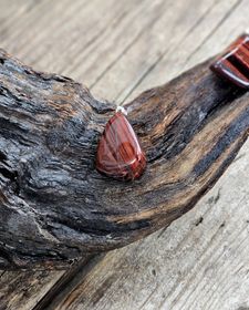 Oxöga trumlad, silverpläterat hänge