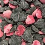 Salta Kärlekar - hårda saltlakrits karameller smaksatta med hallon