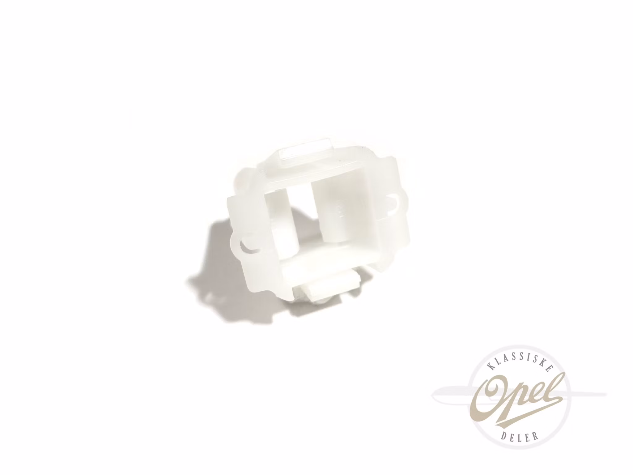 Festeklips til hovedlykt