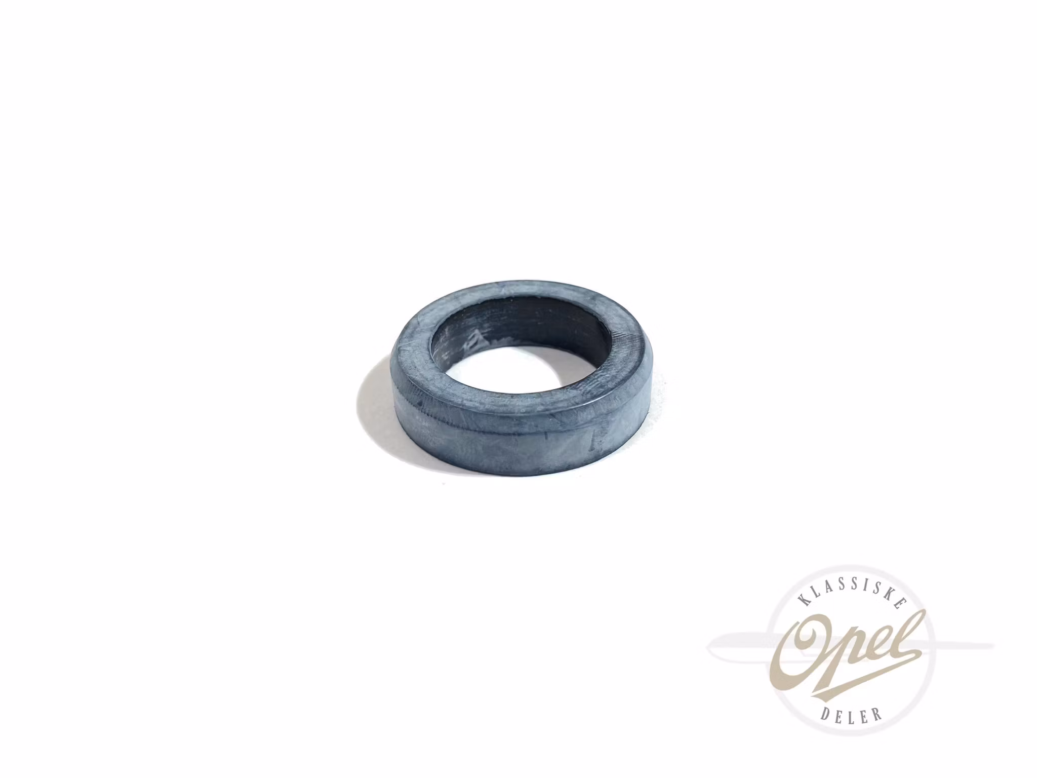 Øvre pakning til innsprøyningsdyse