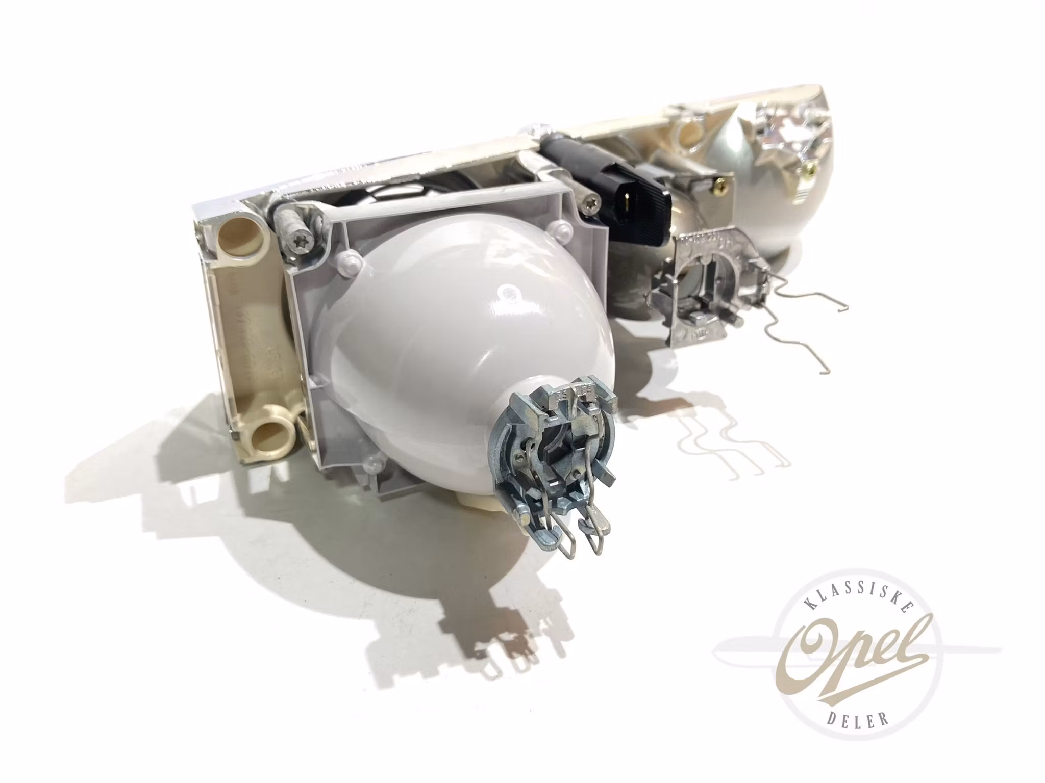 Reflektorenhet til hovedlykt venstre