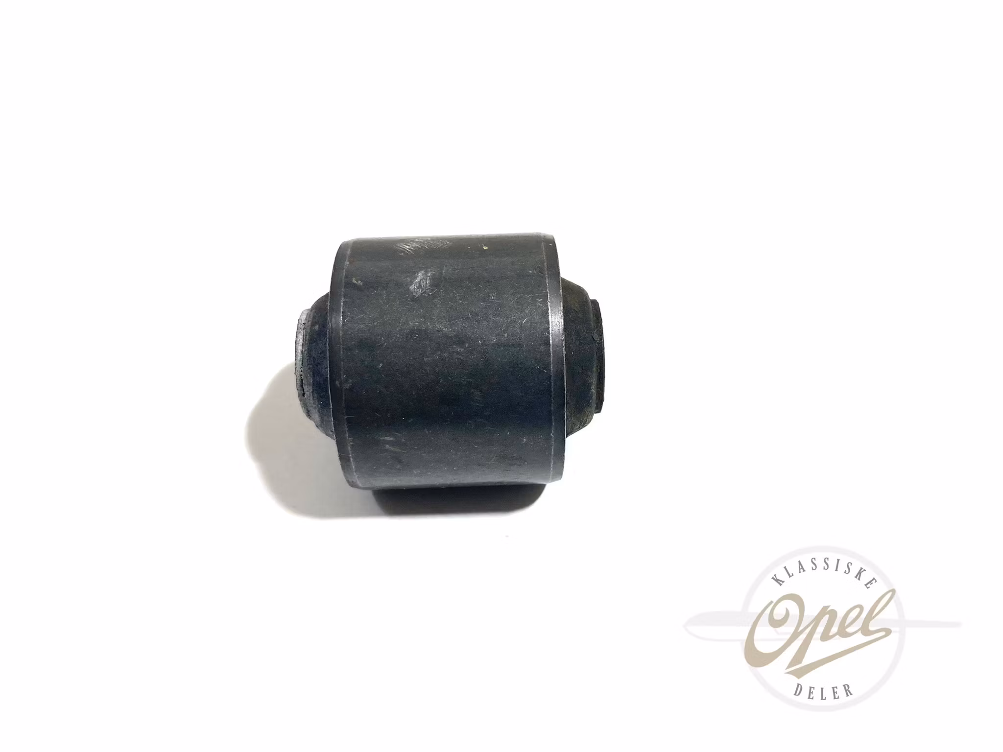 Foring til øvre bakaksel arm