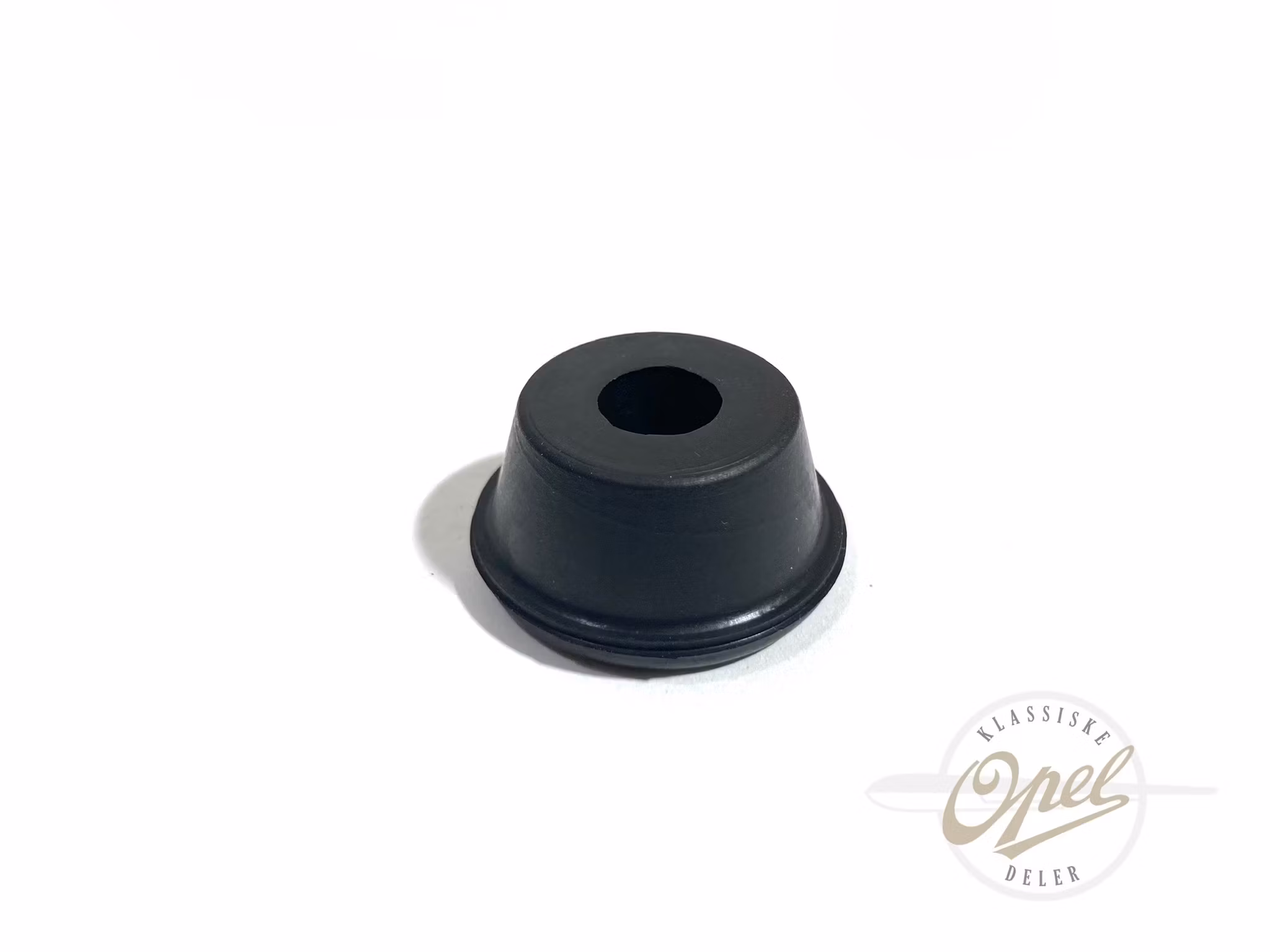 Nedre støtdemperforing bak