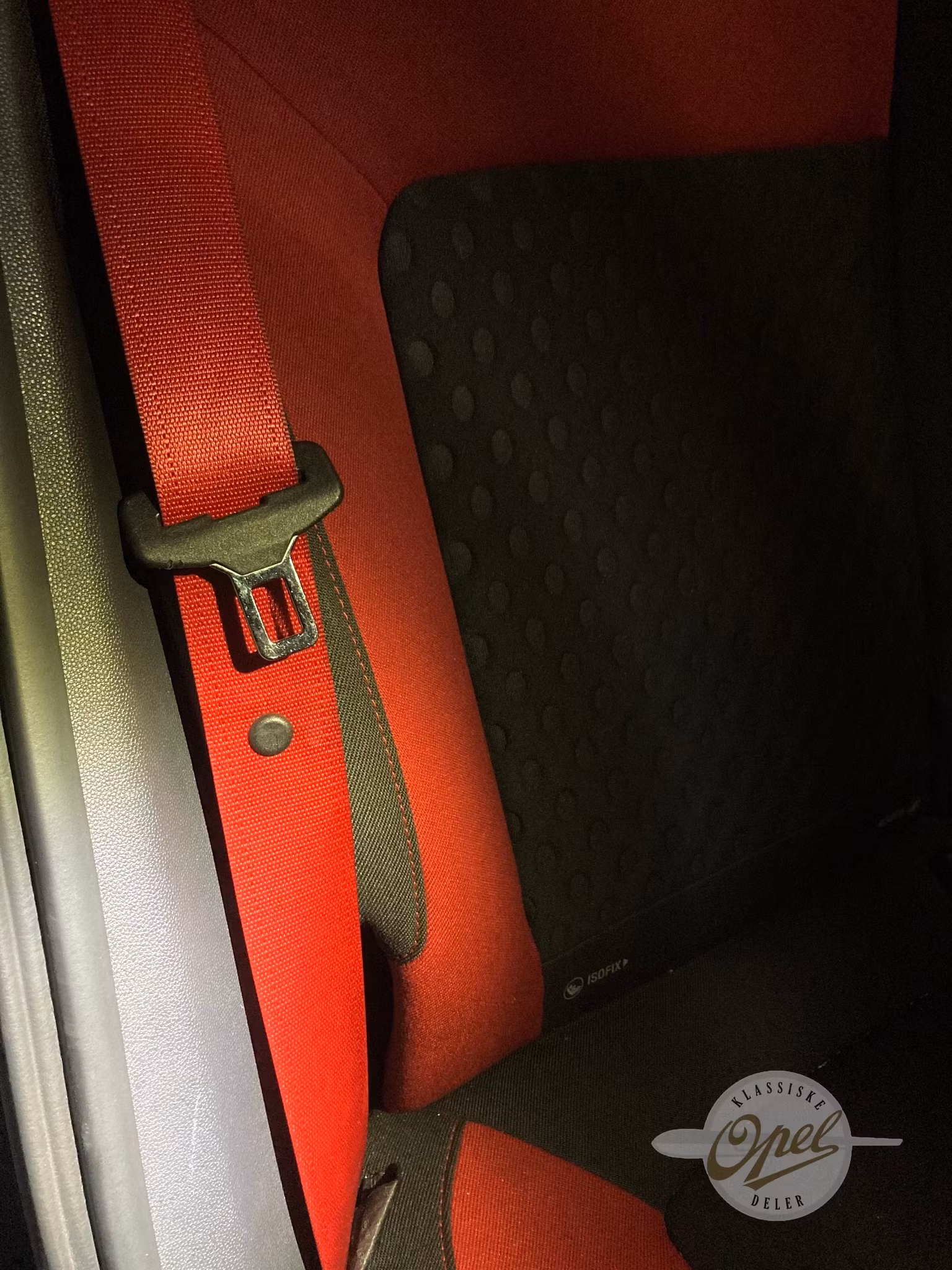 Stopper til låsetunge på bilbelte