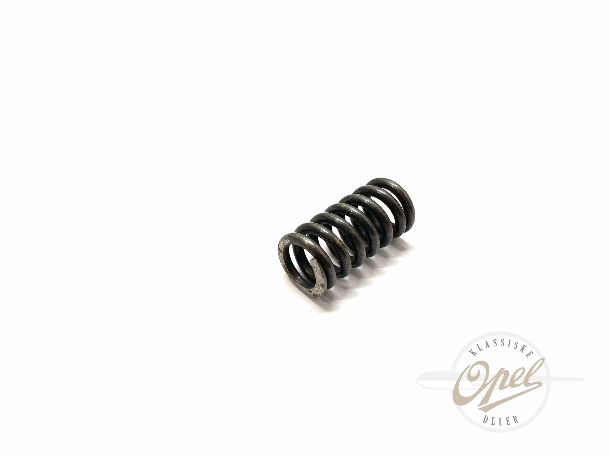 Trykkfjær til parkbremsesko