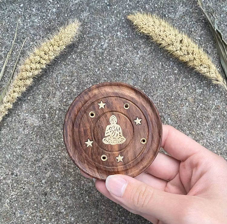 Rökelsehållare för pinnar med buddha emblem