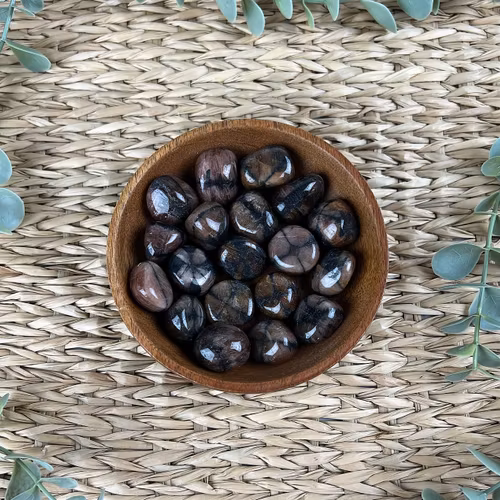 Chiastolit (korssten) trumlad (mellan)