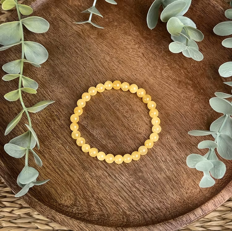 Stenarmband av gul kalcit (6 mm)