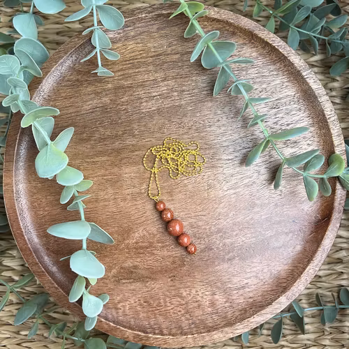 Cassiopeja halsband med Brun Guldsten