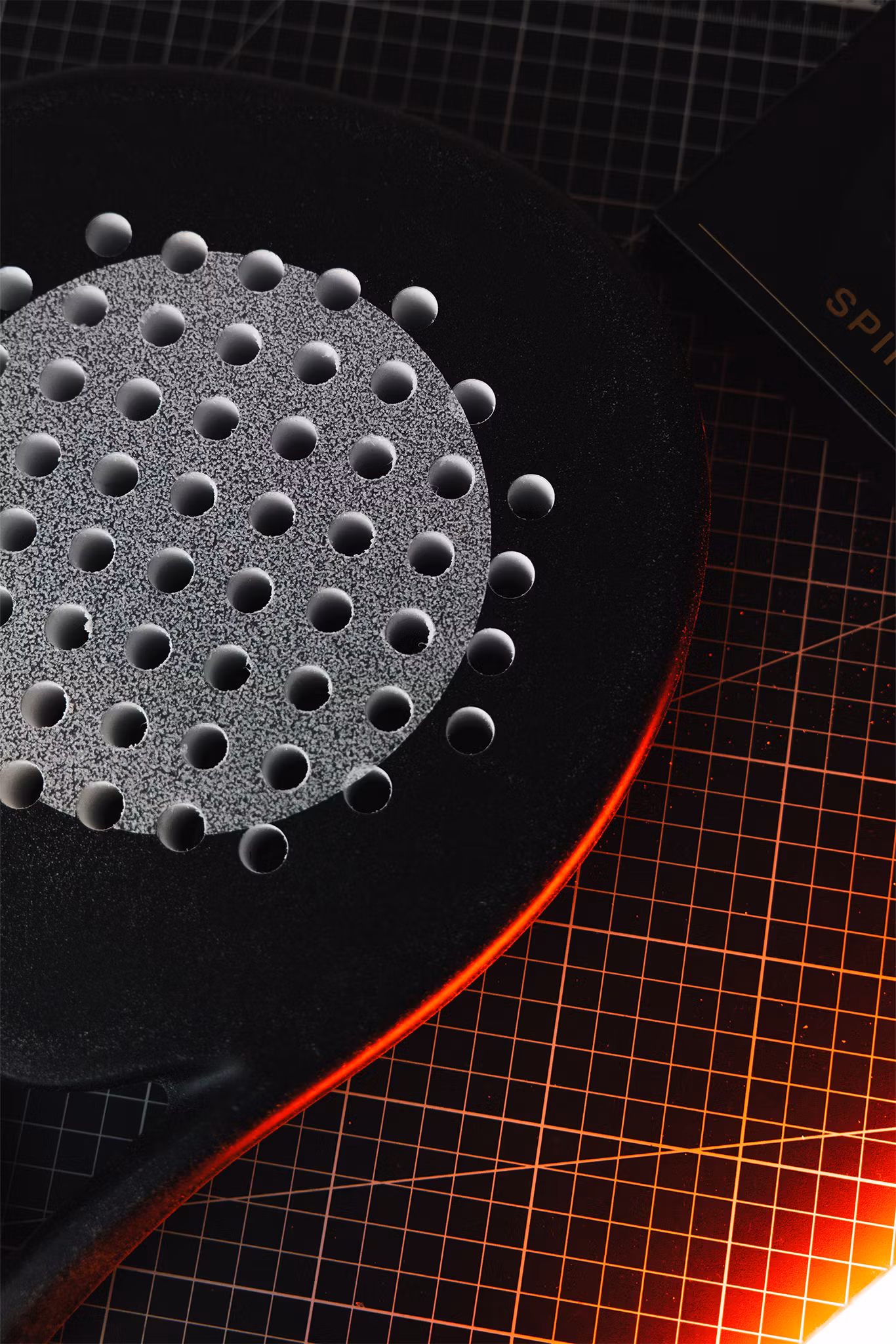 4on SpinMax on a padel racket.