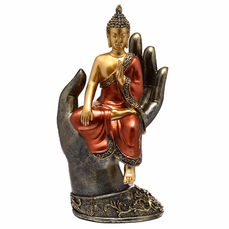 Sittande Thai Buddha i hand i Guld och Rött
