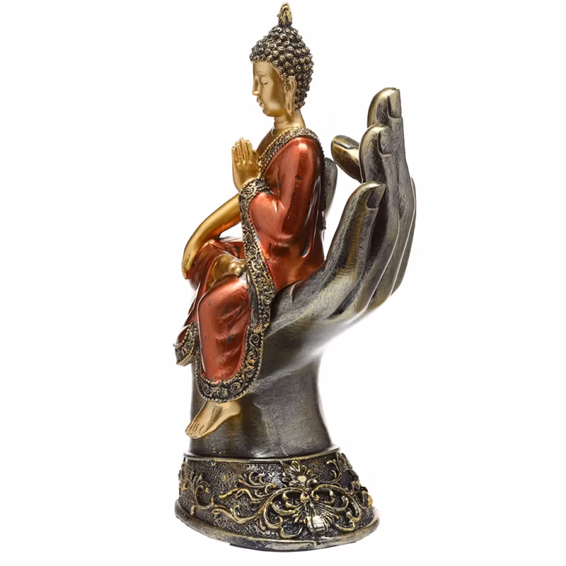Sittande Thai Buddha i hand i Guld och Rött