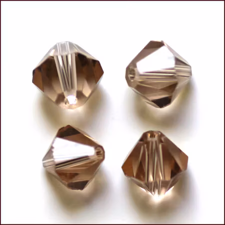 Lyxiga fasetterade Bicon glaspärlor - Klass AAA - camel - 10-p -6x6mm