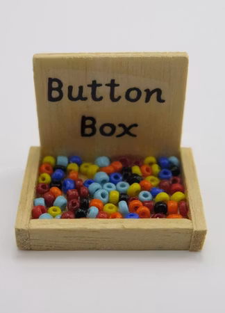 **Miniatyr** Knapp låda