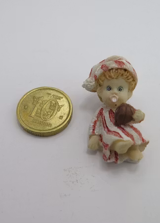 **Miniatyr** Sittande baby rosa