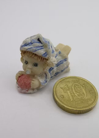 **Miniatyr** Liggande baby blå