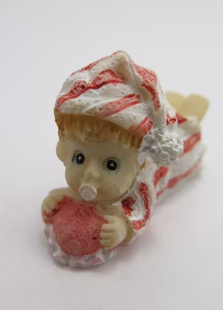 **Miniatyr** Liggande baby rosa