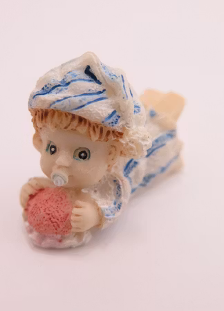 **Miniatyr** Liggande baby blå