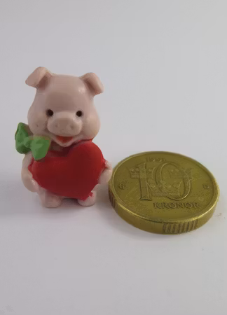 **Miniatyr** Gris med hjärta