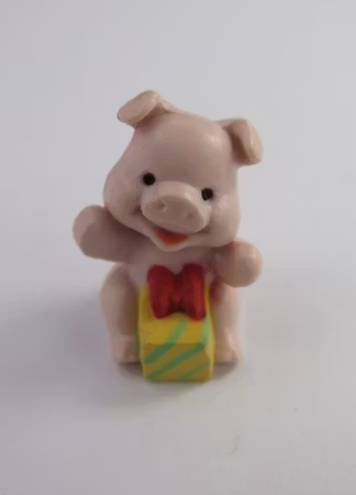 **Miniatyr** Gris med paket